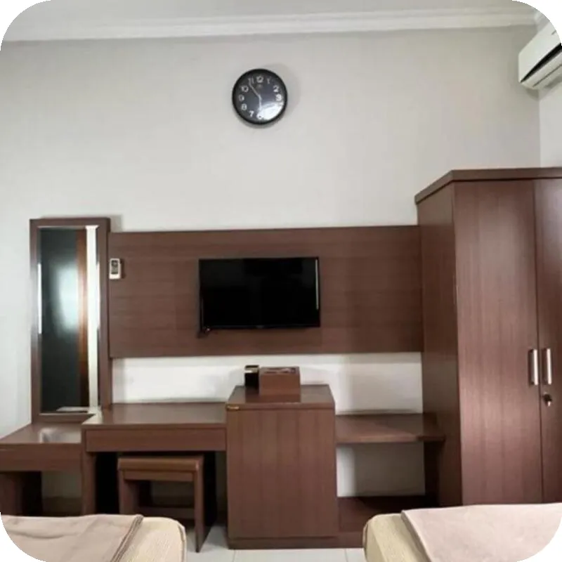 Hen’s GuestHouse Syariah hotel room